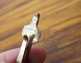 Antique Gold Plated Merritts Tie Lapel Pin